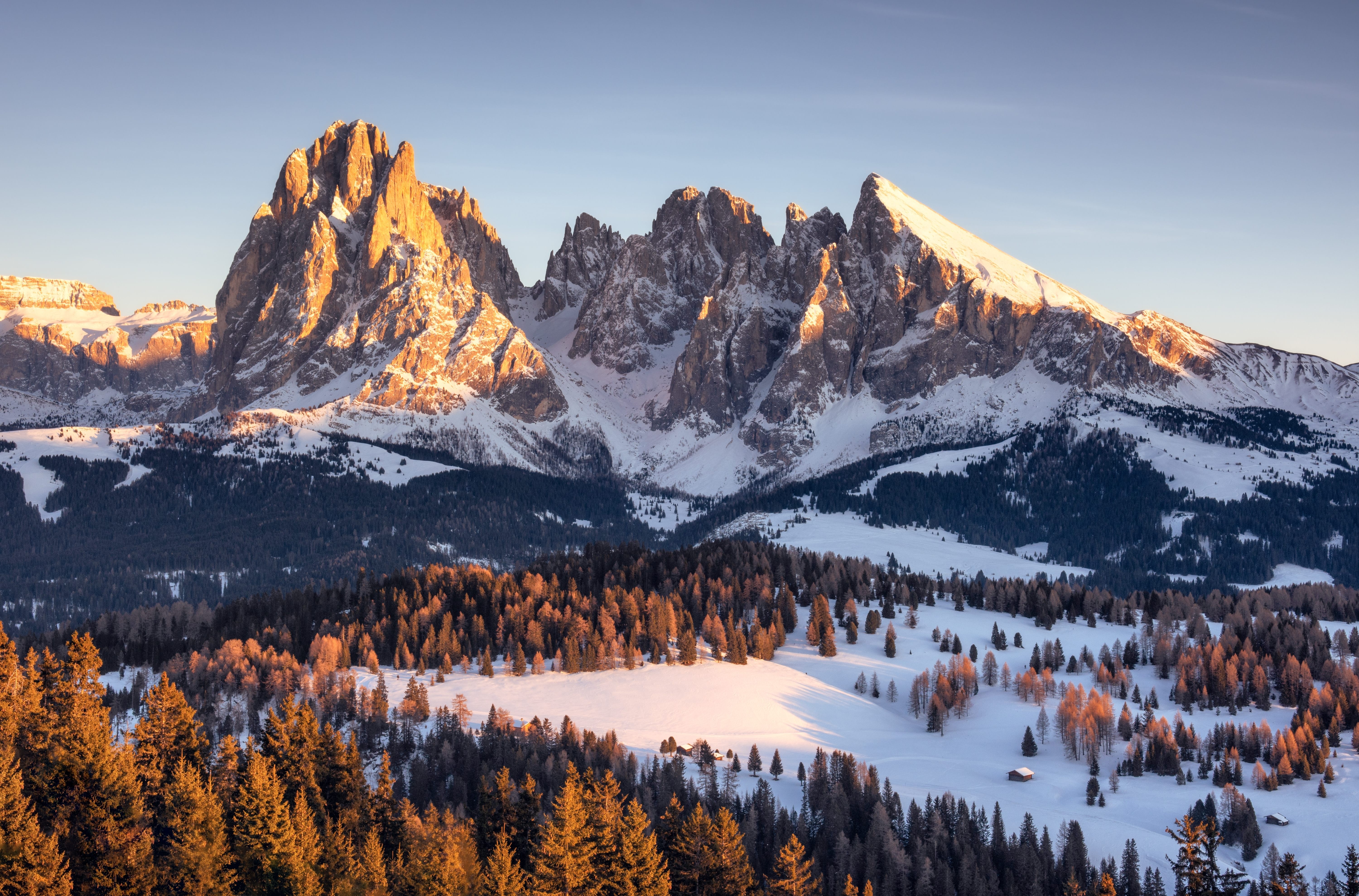 Aerial view over the Seiser Alm during a winter sunny day in the Dolomites, Italy
