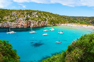 boats in turquoise bay in Majorca, Balearic Islands
