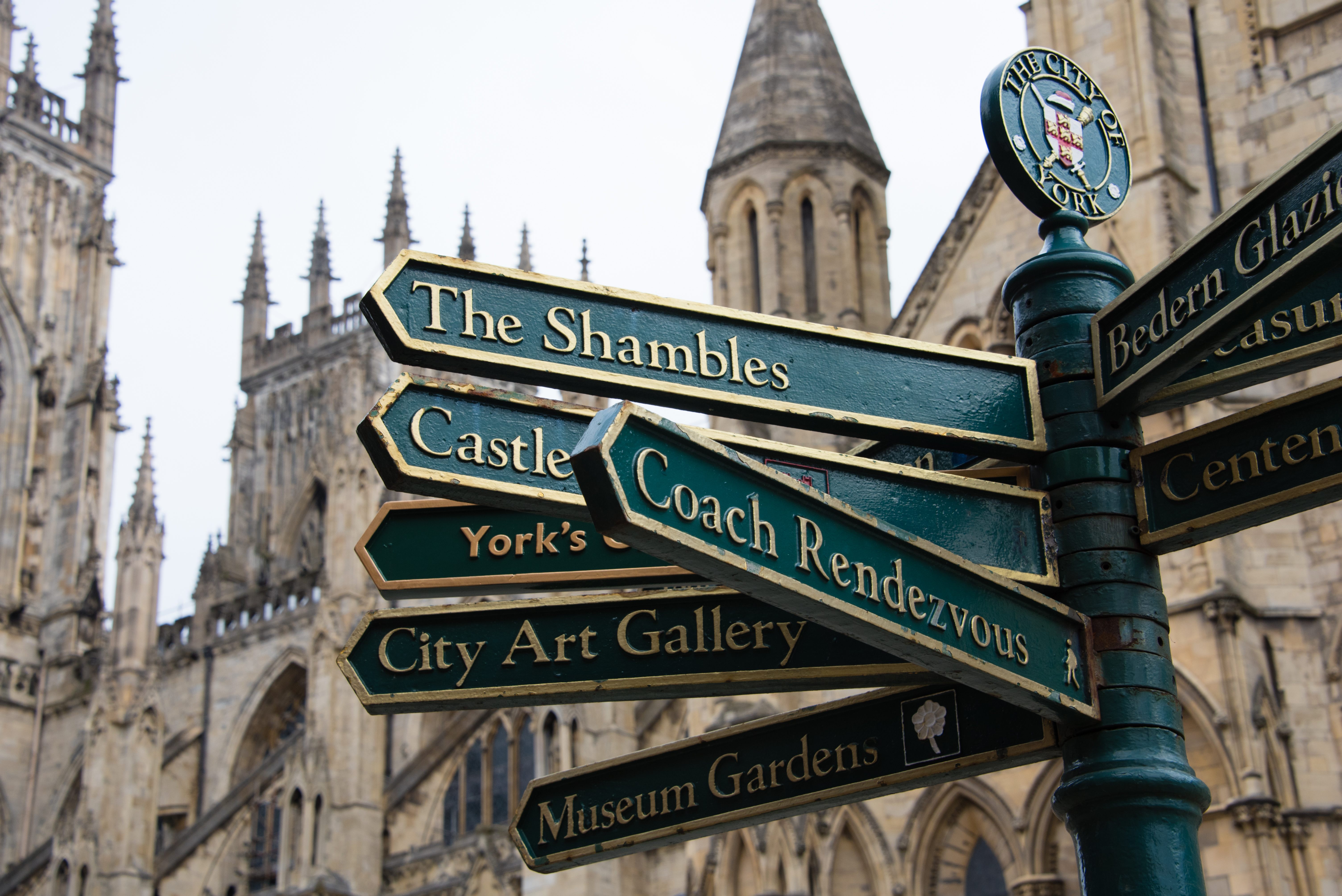 The colourful signposts in York City Centre point the way to many tourist attractions including the Shambles