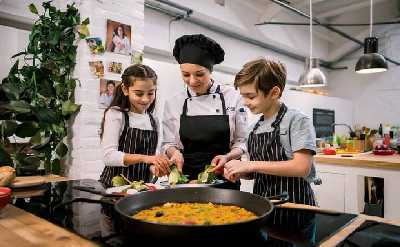 Private Barcelona Paella Masterclass with Market Visit & Personal Chef