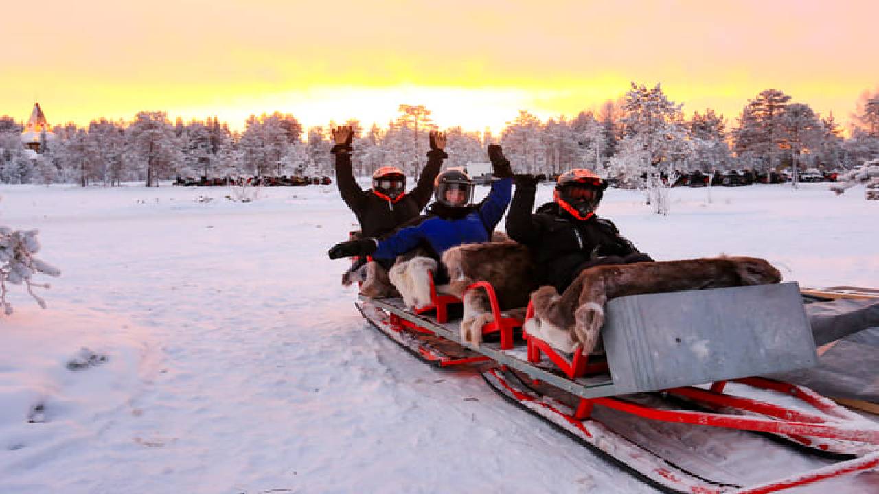 Family Snowmobile Sledge Ride