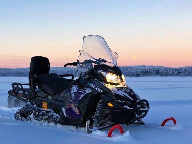 Taste of electric snowmobiling safari, Rovaniemi