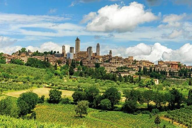 Tuscan Day Trip: Medieval Villages, Cooking Class & Wine Tasting