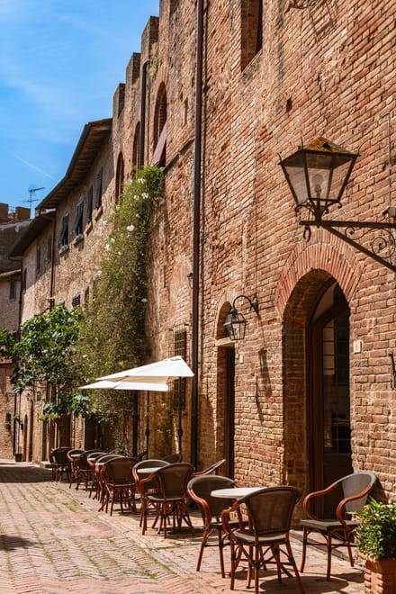 Tuscan Day Trip: Medieval Villages, Cooking Class & Wine Tasting